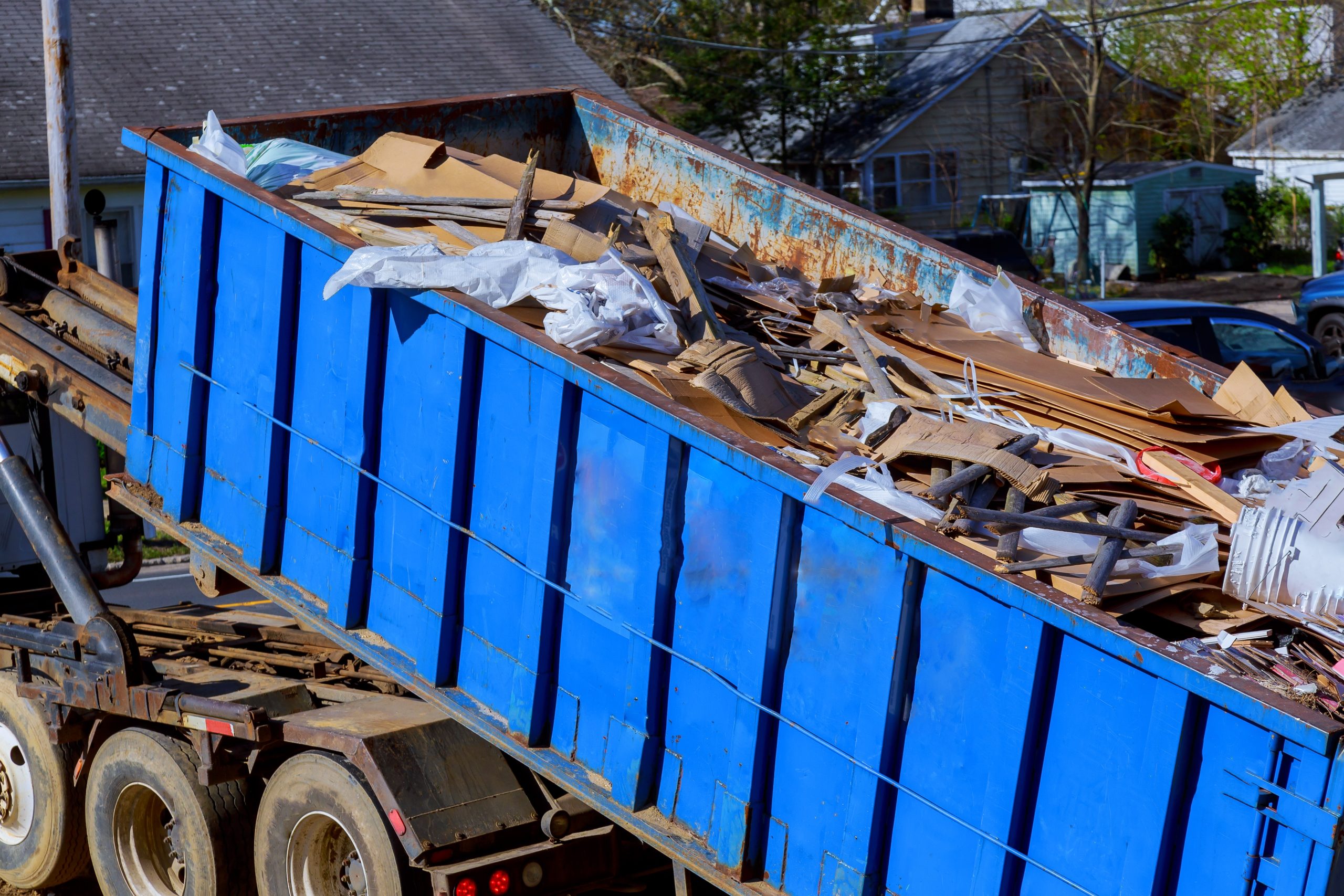 recycling garbage collector truck loading waste and removable container