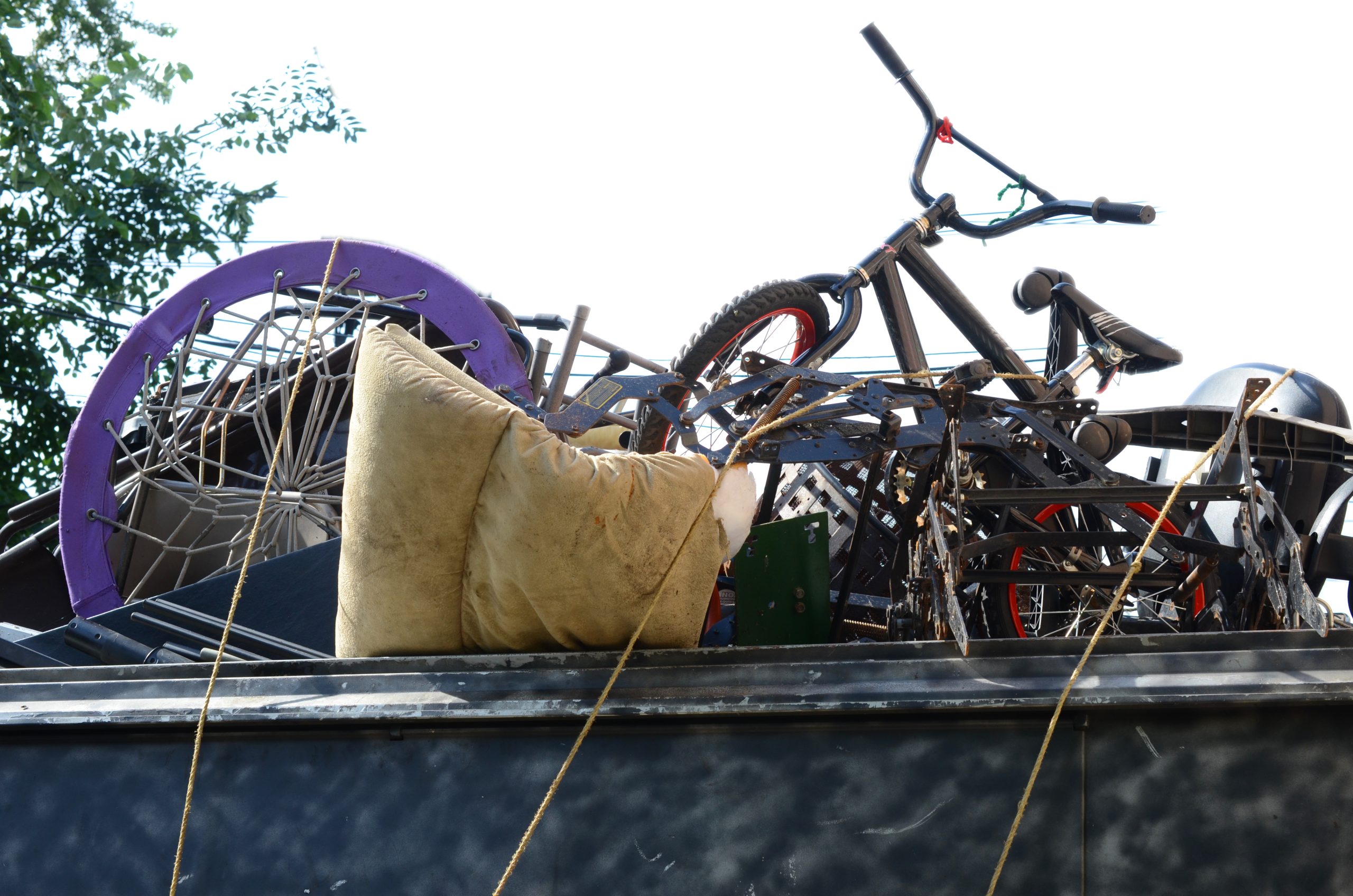 old metal junk removed in a container